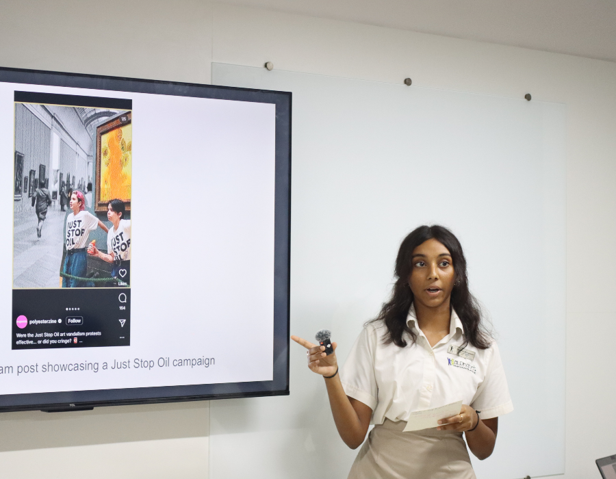 Students presenting at the TOK Exhibition