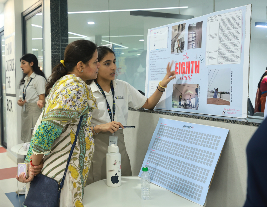 Students presenting their projects at an exhibition
