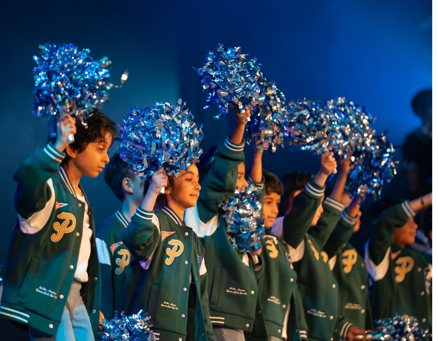 Students performing on stage